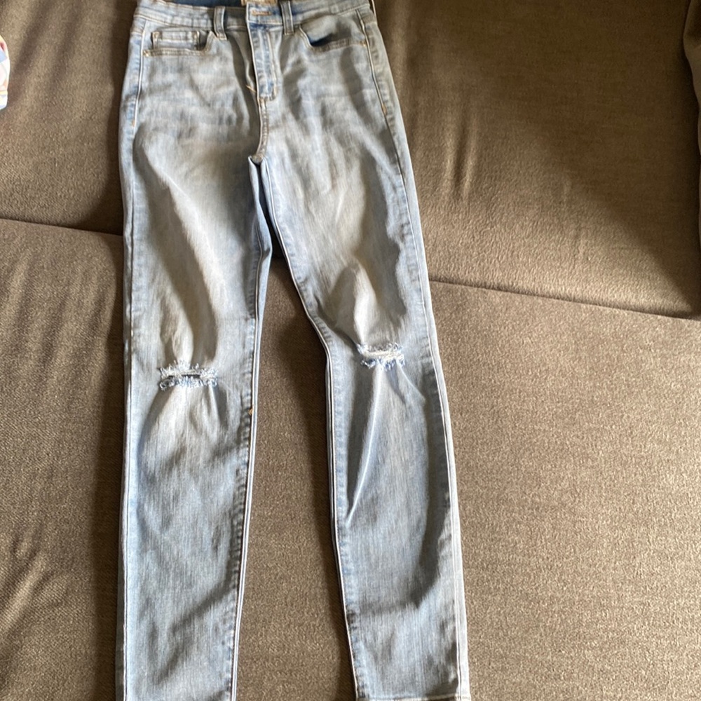 I am selling a light Blue ripped jean from Francesca’s